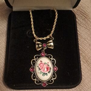 Vintage-Inspired Gold Bow Pendant Necklace with Pink Rose Cameo